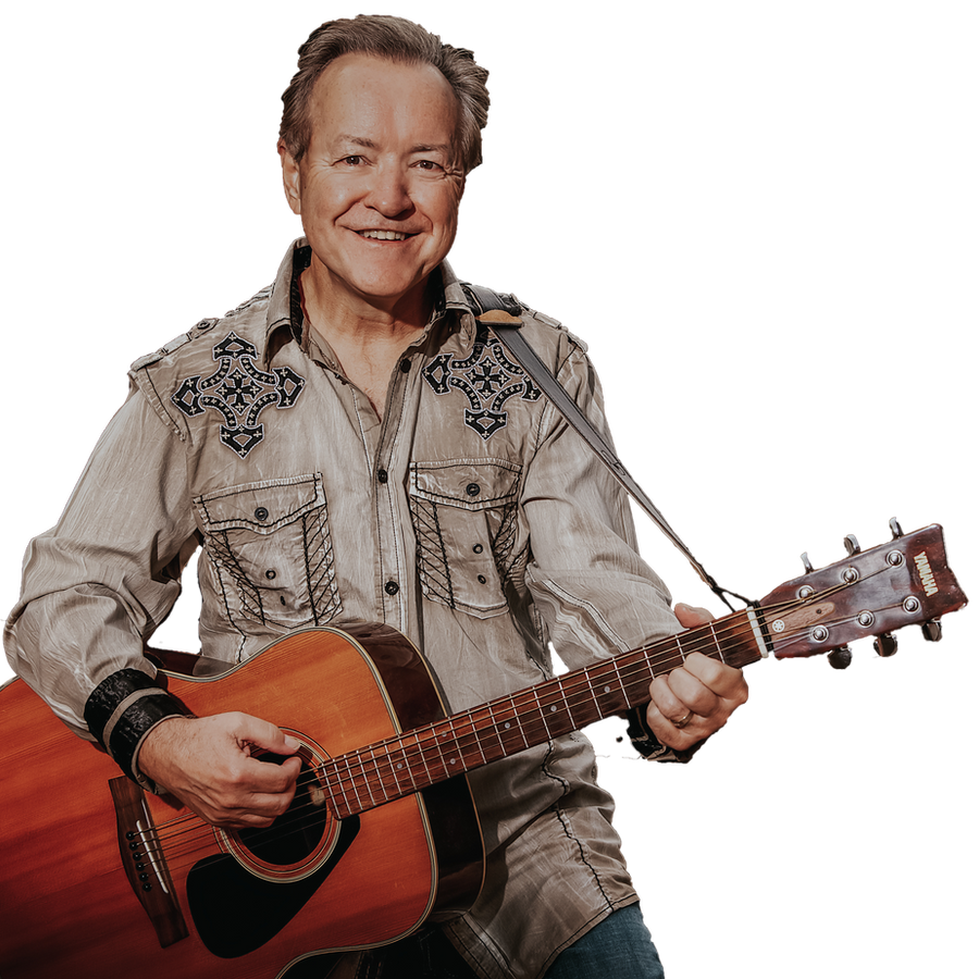 Bobby G. Rice performing with guitar